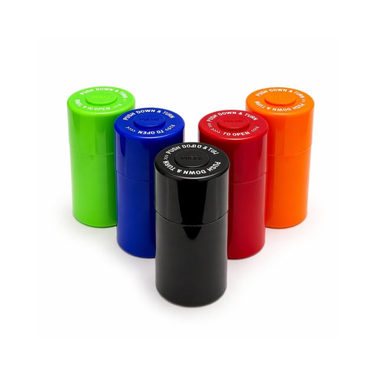 Five different coloured cylindrical airtight containers on a white background